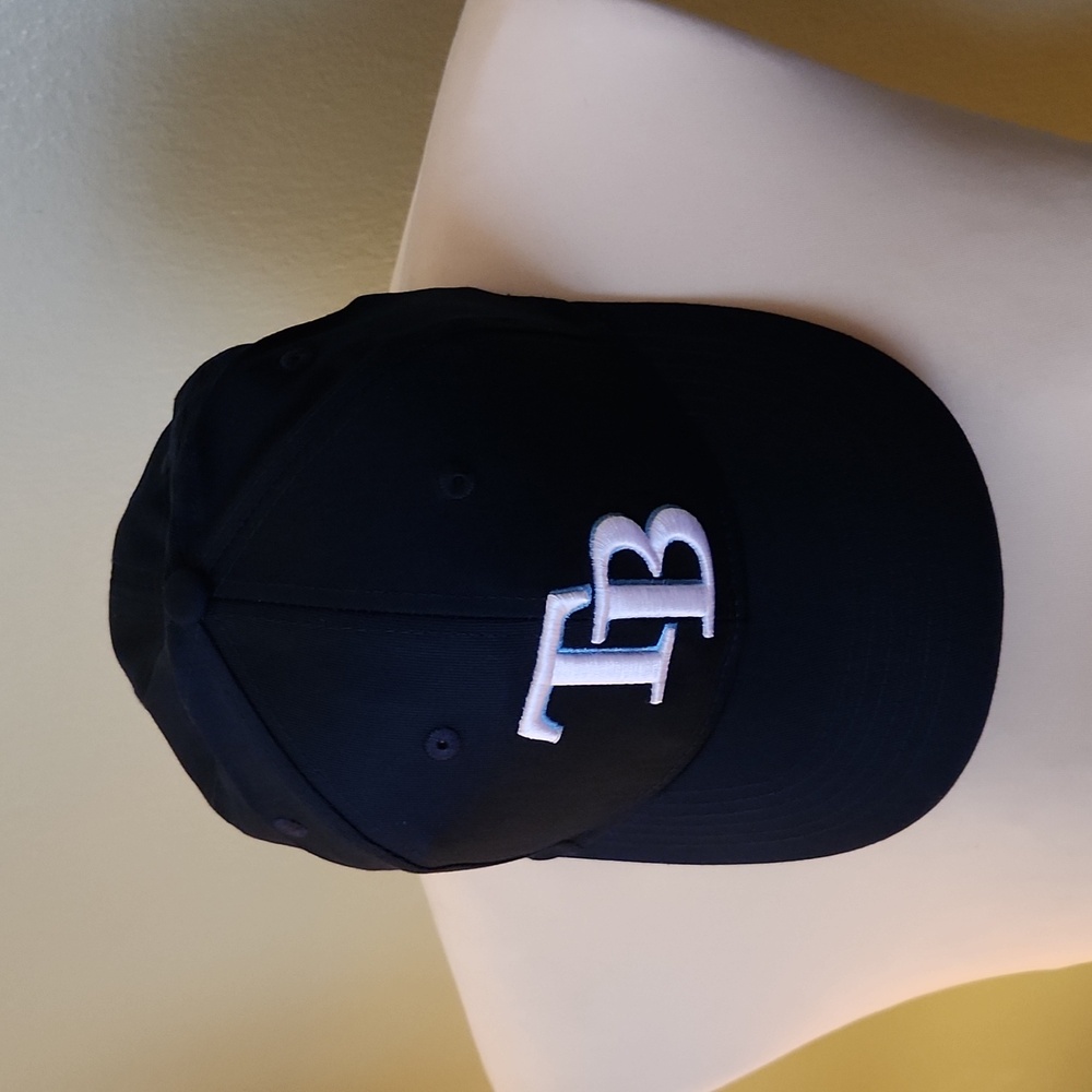 Tampa Bay Rays youth baseball cap, never worn. Snap back.